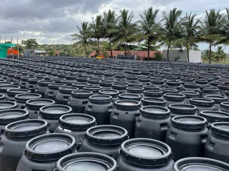 Filled barrels stored in our yard, ready to ship